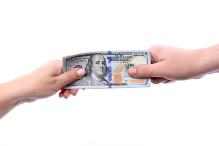 The transfer of arms in the hands of new U S  hundred dollar bills put into circulation in October 2013 の写真素材