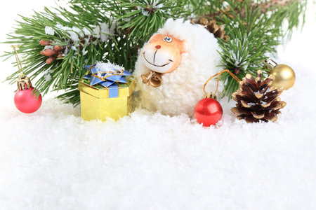 New Year composition with a sheep - a symbol of 2015 on east calendar, on a white background. space for text.の写真素材