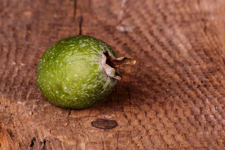 Feijoa Fruit on a wooden background closeupの写真素材