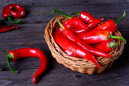 Red chili pepper on a kitchen tableの写真素材