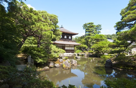 Japanese Temple in the midst of nature and a lakeの写真素材