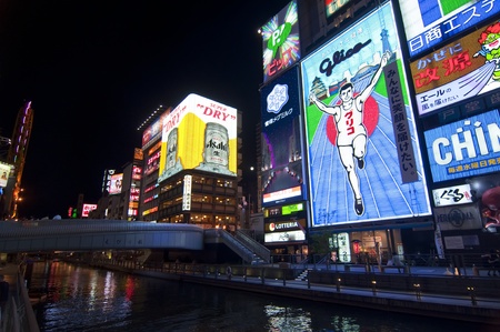 OSAKA, JAPAN, JULY 15: Night view of the famous neon advertisements Dotonbori on July 15, 2011 in Osaka, Japan.  D?tonbori is famous for its historic theatres ,its shops and restaurants, and its many neon and mechanised signsのeditorial素材