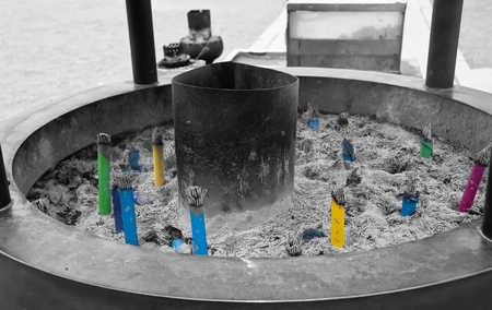 Incense burning in the entrance of a Japanese temple  in black and white and selective de-saturationの写真素材