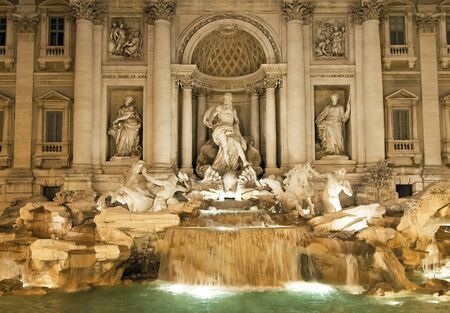 Main facade of the famous Trevi Fountain in Rome.Night viewの写真素材