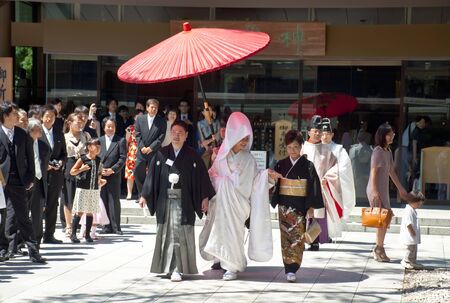  TOKYO, JAPAN, JULY 10: Celebration of a typical wedding in Japan on July 10, 2011 in Tokyo, Japan.   The date that most weddings are held in November is the month because the 11 is a lucky number. The wedding is rapid, flow, protocol and little joy. のeditorial素材