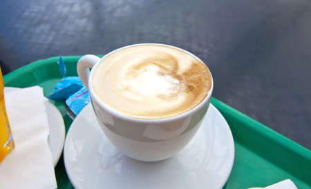 A cup of cappuccino coffeeの写真素材