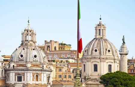 View of the city of Rome with the statue of Trajanの写真素材