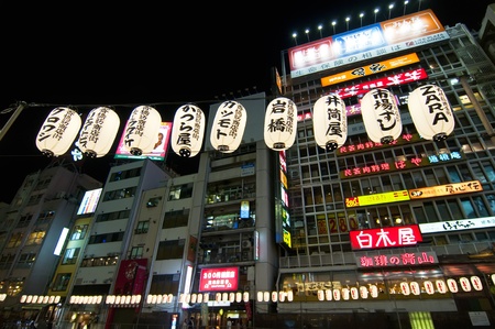 OSAKA, JAPAN- JULY 15: Night view of the famous neon advertisements Dotonbori on July 15, 2011 in Osaka, Japan.  D?tonbori is famous for its historic theatres ,its shops and restaurants, and its many neon and mechanised signsのeditorial素材