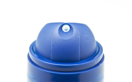 Aerosol spray can on white background