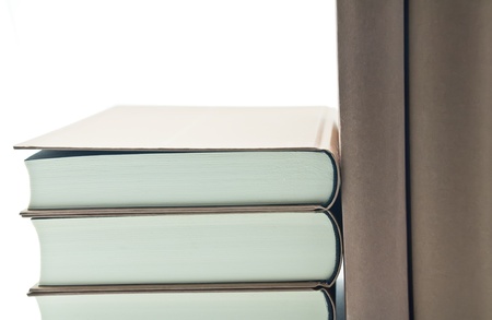 Reading several books on white backgroundの写真素材