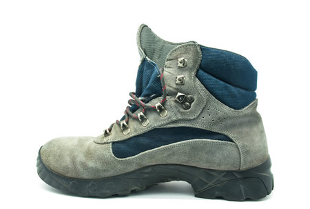  Mountain boot worn over white background