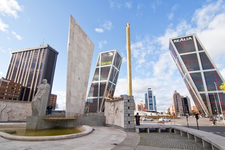MADRID, SPAIN - APRIL 7: Plaza Castilla on April 7, 2012 in Madrid, Spain.  Located in the north of the city and is crossed by the Paseo de la Castellana. And in it are the Torres Kio, the Obelisk of the Fund and the monument to Jose Calvo Soteloのeditorial素材
