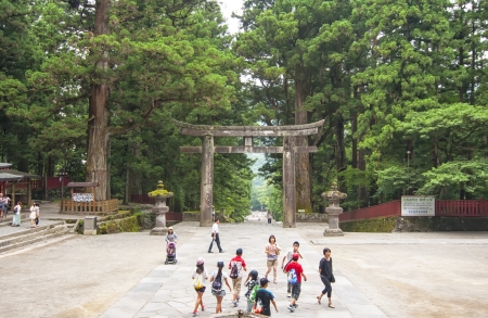 NIKKO, JAPAN - JULY 7: Tourists walk at Toshogu shrine entrance on July 7, 2011 in Nikko, Japan. Toshogu is World Heritage site and contains five structures that are JPN National Treasures. のeditorial素材