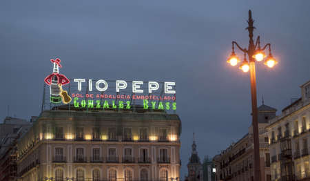 MADRID, SPAIN-MARCH 27: Tio Pepe neon sign in the Puerta del Sol on March 27, 2010 in Madrid, Spain.  It was installed 77 years ago, and finally retired in 2012のeditorial素材