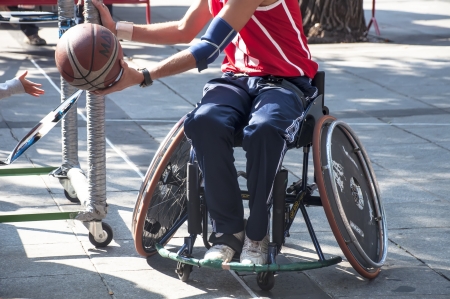 TOLEDO, SPAIN, OCTOBER 1: Some unidentified people playing a friendly game of wheelchair basketball, one of the activities in the Youth Week on October 1, 2011 in Toledo, Spainのeditorial素材