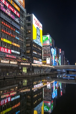 OSAKA, JAPAN- JULY 15: Night view of the famous neon advertisements Dotonbori on July 15, 2011 in Osaka, Japan.  Dotonbori is famous for its historic theatres ,its shops and restaurants, and its many neon and mechanised signsのeditorial素材