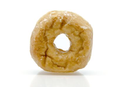 Donut with reflection on white backgroundの写真素材