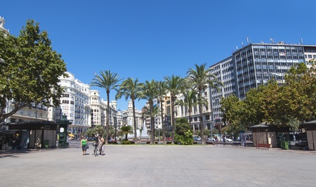 VALENCIA, SPAIN - SEPTEMBER 10: Unidentified people walking at the town hall square in Valencia, Spain, September 10, 2011.  The square is triangular and it is the Town Hall and the Post Officeのeditorial素材