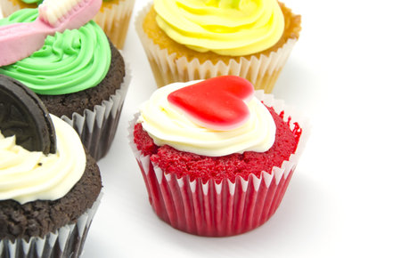 A colorful cupcakes on white backgroundの写真素材