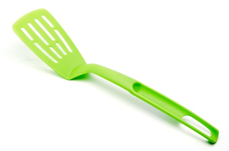 Green Spatula kitchen  on white backgroundの写真素材