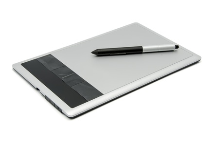 Graphics tablet with pen on white backgroundの写真素材