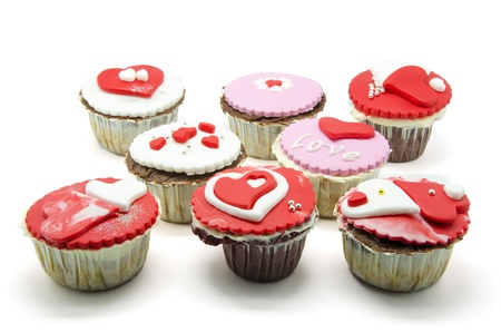 Gourmet cupcakes with hearts and decorationsの写真素材