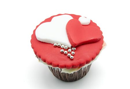 Gourmet cupcakes with hearts and decorationsの写真素材