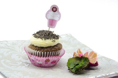 Cupcake decorated on a napkinの写真素材