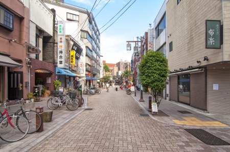 TOKYO, JAPAN-JULY 4: Traditional Neighborhood Yanaka on July 4,2011 in Tokyo, Japan. In are tourist location, Yanaka Cemetery and the famous garden Rikugi-in, steeped in serenity.のeditorial素材