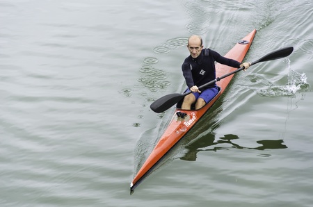 PLENTZIA, SPAIN - OCTOBER 14  unidentified kayaker surfing the ria on October 14, 2012 in plentzia, spain  Kayaking is practiced on a light boat, typically fiberglass or plasticのeditorial素材