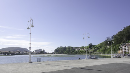 Promenade of Ribadesella on a blue skyの写真素材