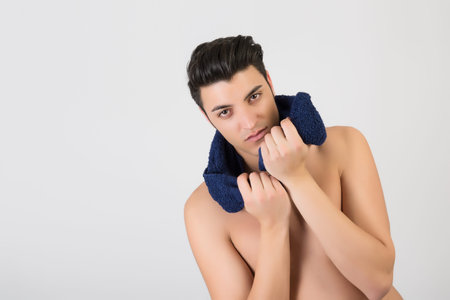 Young man with a towelの写真素材