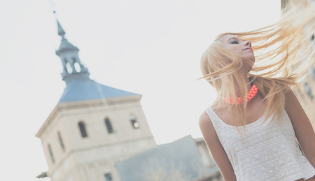 Beautiful young woman in the sreetの写真素材
