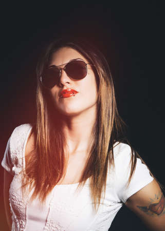 Beautiful young woman with sunglassesの写真素材