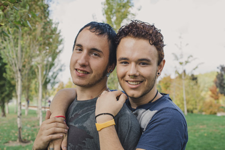 Loving gay couple in outsiteの写真素材