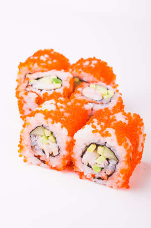 sushi roll in tobiko isolated on white backgroundの写真素材