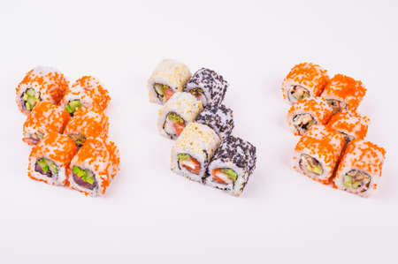 three sushi rolls isolated on white backgroundの写真素材