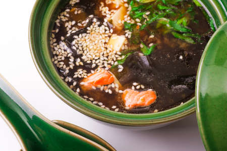 salmon miso soup isolated on white backgroundの写真素材