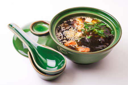 salmon miso soup isolated on white backgroundの写真素材