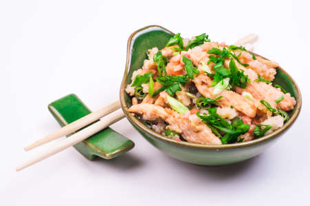 chicken fried rice in bowl isolated on white backgroundの写真素材