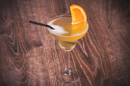 alcohol orange cocktail drink in high  glassの写真素材