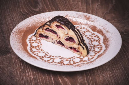 Slice of fruit cake on white plateの写真素材