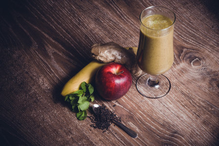 healthy banana and apple smoothie with fruits