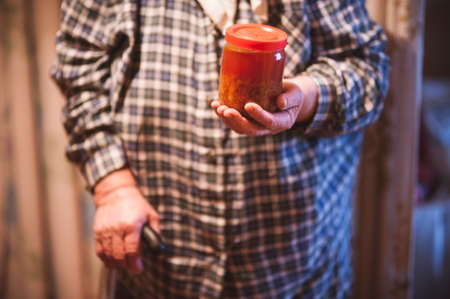 men holding portion of free food ukraine donbassの写真素材