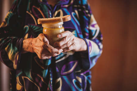 men holding portion of free food ukraine donbassの写真素材