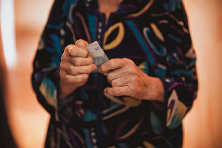 women donating her last money ukraine donbassの写真素材