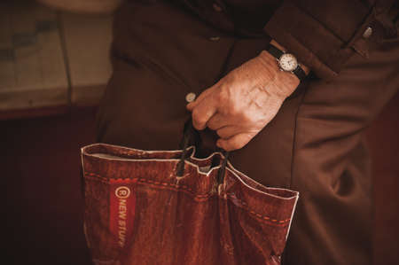 pure old men holding bag  no faceの写真素材