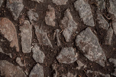 stone path track on ground texture backgroundの写真素材