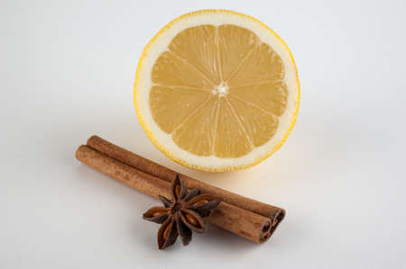 cinnamon,  star anise and lemon on white backgroundの写真素材