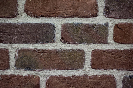 Texture of dark red brick wall background